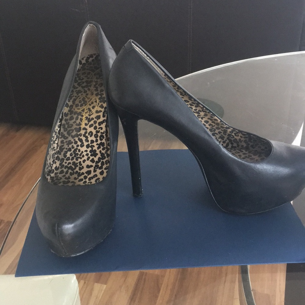 Black leather pumps